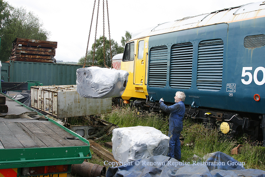 Spare traction motor being unloaded