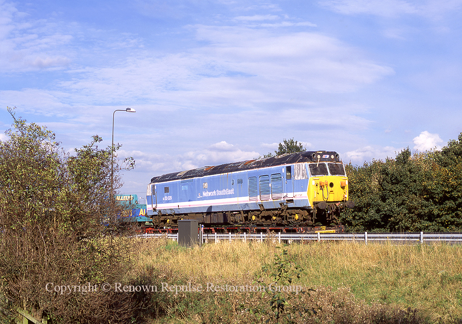 50029 at junction 14 of the M1 moving to Peak Rail in October 2002